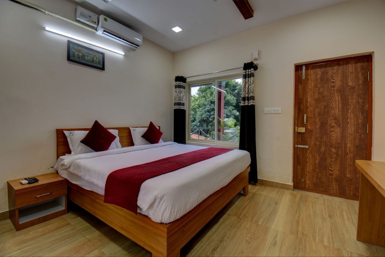Sophisticated guest room styled with premium polished wood flooring